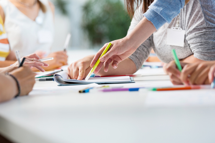 working together. Close up of hands.